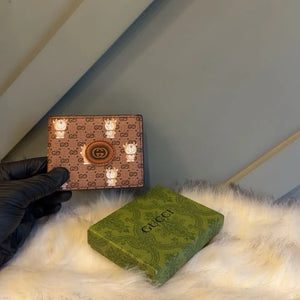 Classic GG Embossed Bi-Fold Leather Wallet