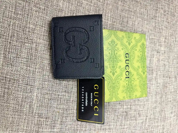 GG Embossed Textured Leather Bifold Wallet - GUCCI