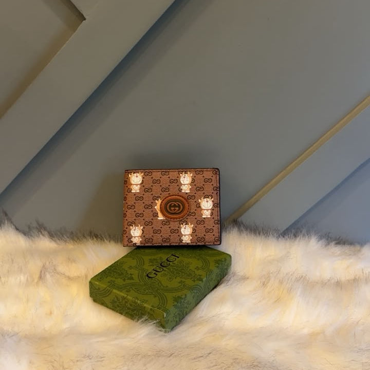 Classic GG Embossed Bi-Fold Leather Wallet