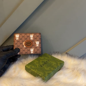 Classic GG Embossed Bi-Fold Leather Wallet