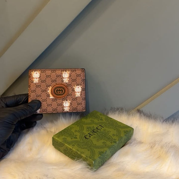 Classic GG Embossed Bi-Fold Leather Wallet