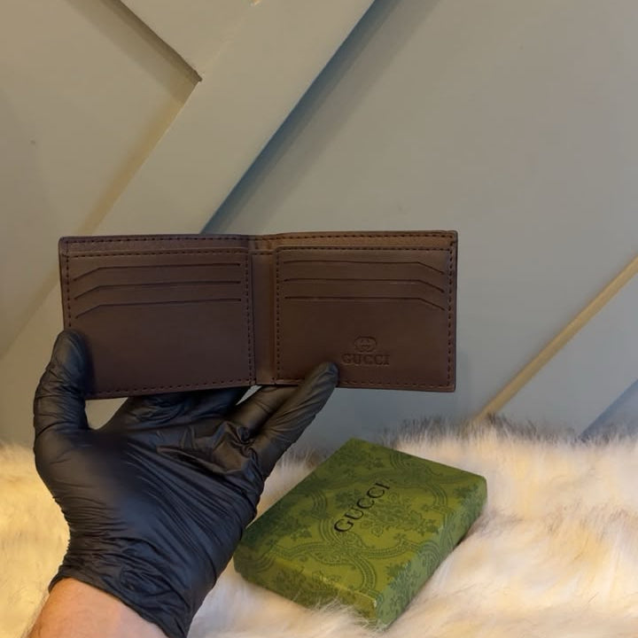 Classic GG Embossed Bi-Fold Leather Wallet